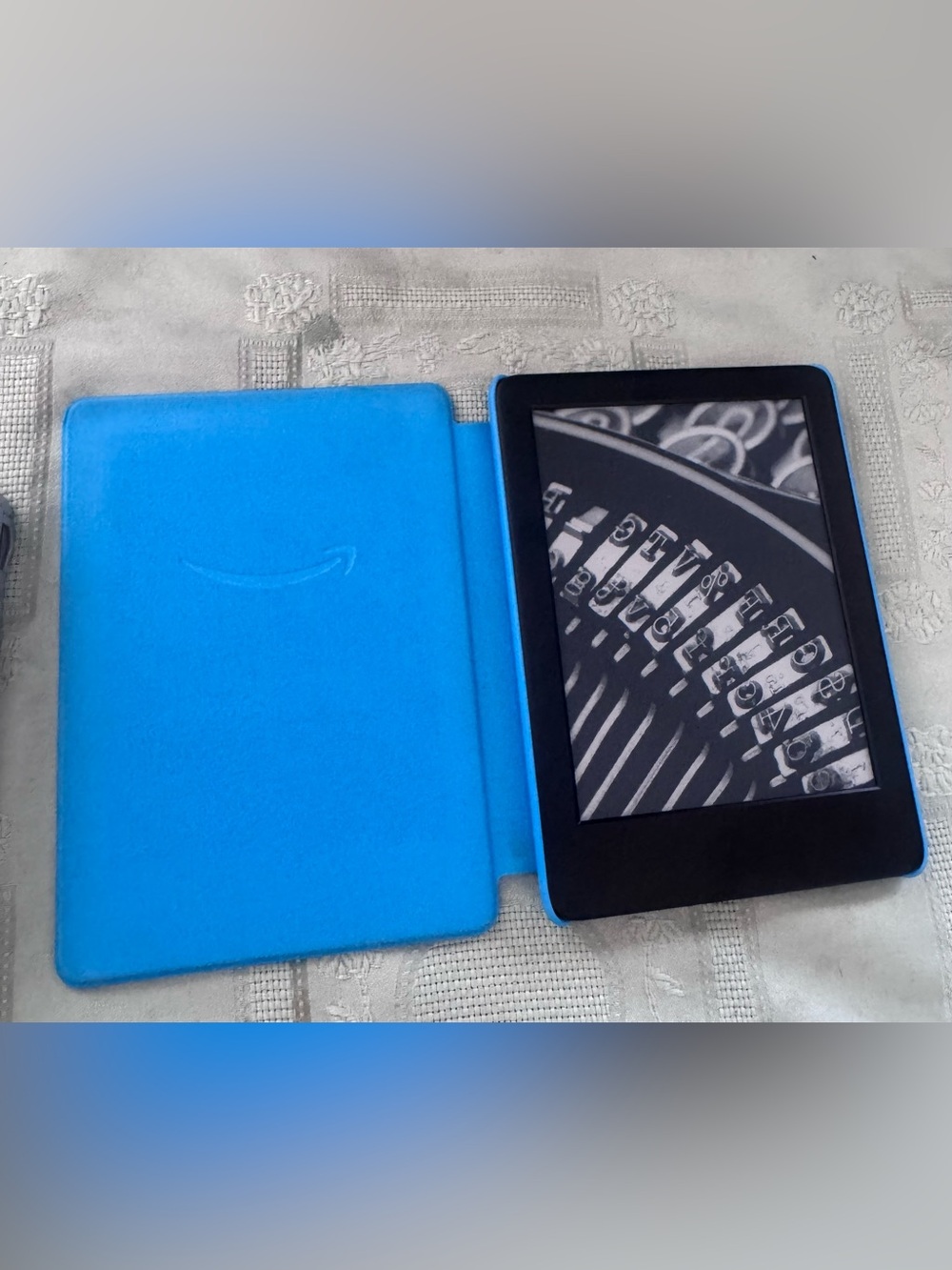 Amazon Kindle with Bright Blue Cover - Compact E-Reader